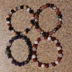 4 Beaded Bracelets. NWOT. OS. Stretchy. Lightweight. Colorful. Meaningful.